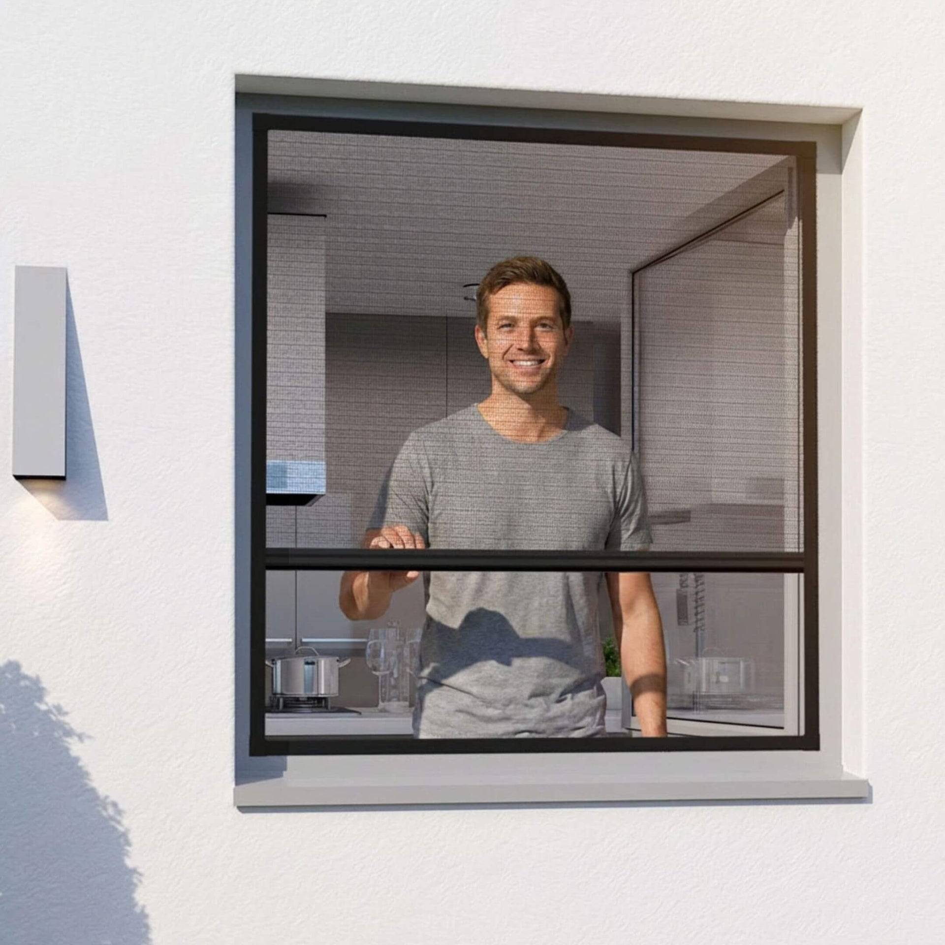 Plissee Fliegengitter Fenster mit Rahmen in Anthrazit an einem geöffneten Fenster