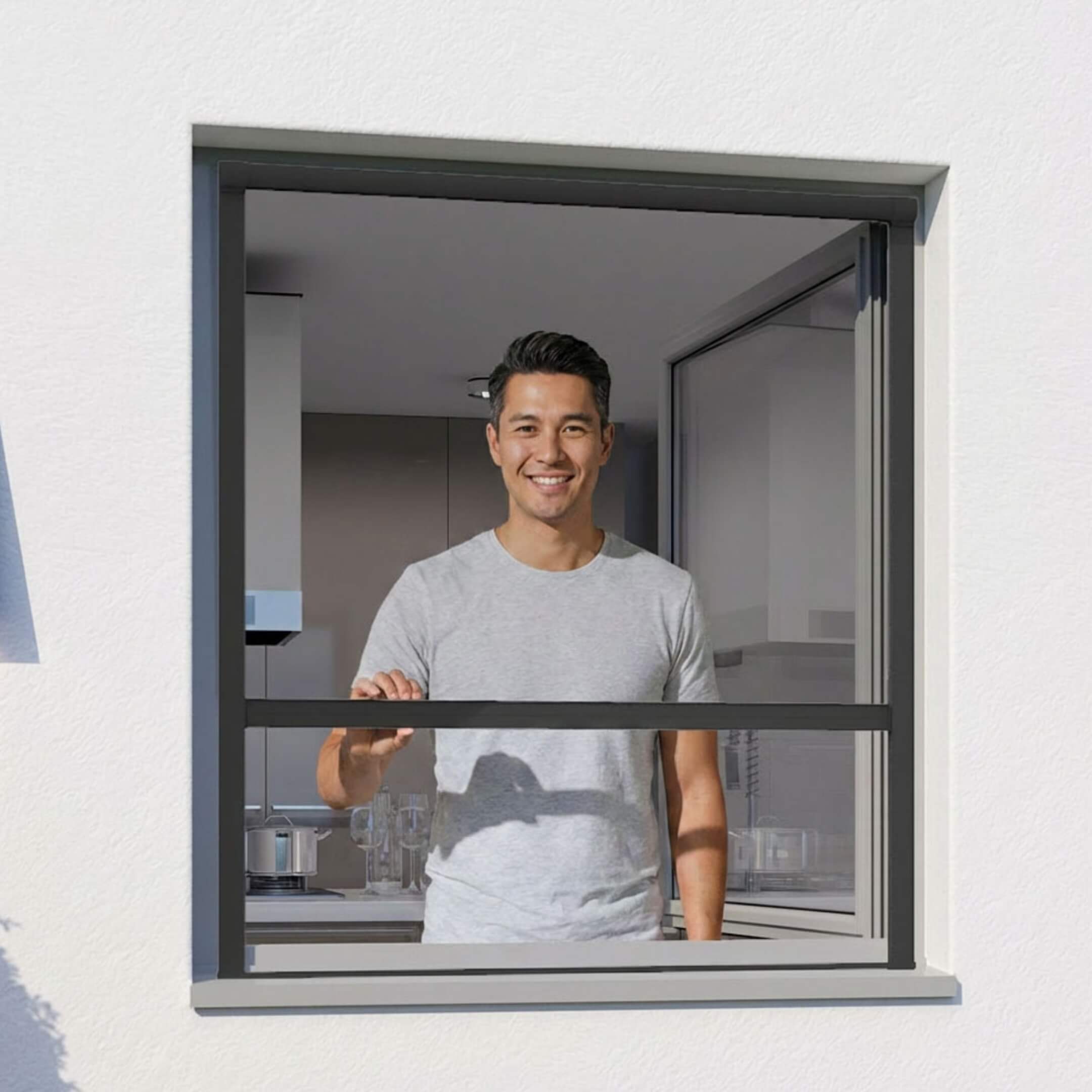 Fliegengitter Rollo für Fenster in Anthrazit an einem geöffneten Fenster
